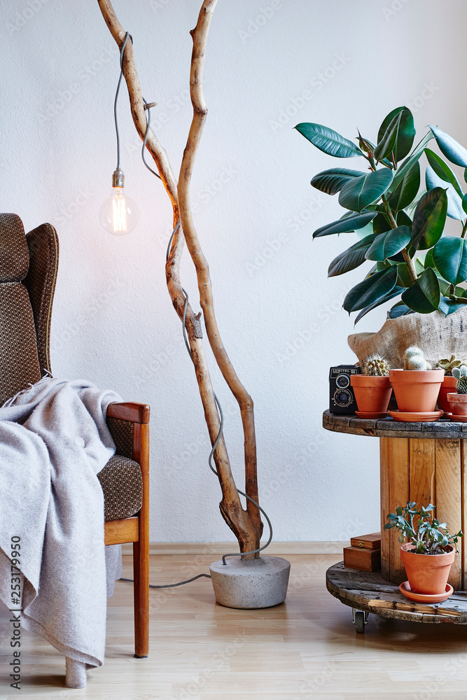 creative interior upcycling design cable drum table branch lamp Stock 写真 |  Adobe Stock