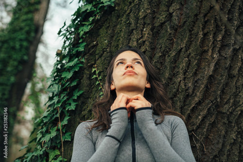 Young beautiful woman exercise in the forest