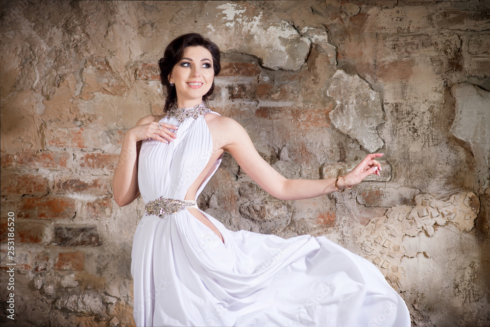 Greek style woman in long white dress. Fashion model Stock Photo | Adobe  Stock