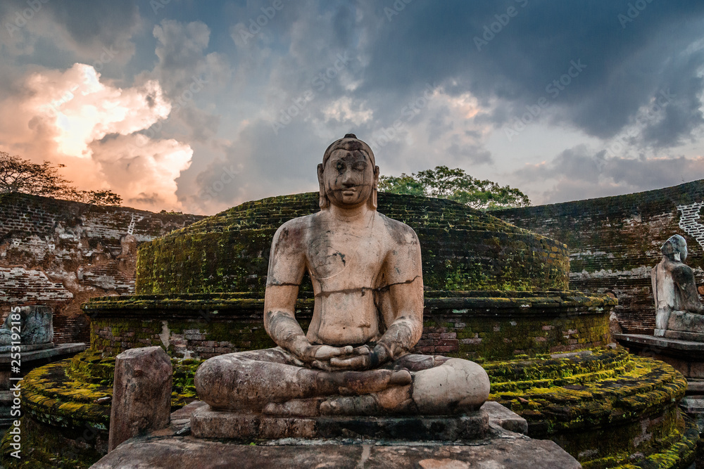 Meditating buddha statue in ancient city of Polonnaruwa, North Central Province, Sri Lanka Meditating buddha statue in ancient city of Polonnaruwa, North Central Province, Sri Lanka