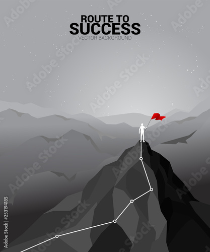 silhouette of businessman with the red flag standing on the top of mountain. Concept of Goal, Mission, Vision, Success in Career path.