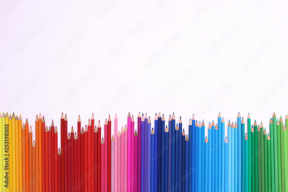Rainbow Pencils. A row of coloured pencils on a white background Rainbow Pencils. A row of coloured pencils on a white background