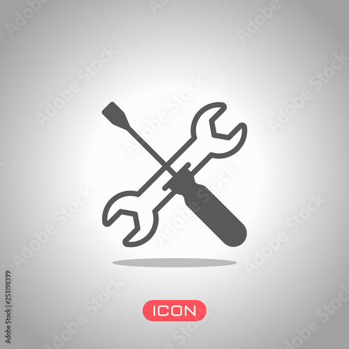 Repair service, wrench and screwdriver, tools. Icon under spotlight. Gray background