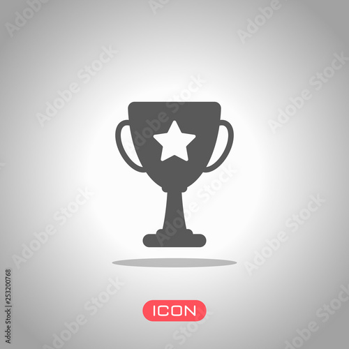 Champions cup with star. Simple icon. Icon under spotlight. Gray background