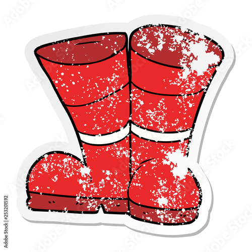 distressed sticker of a wellington boots cartoon