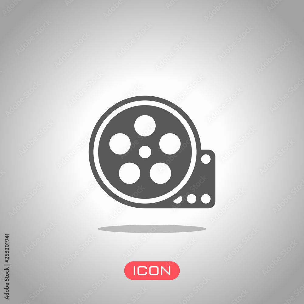 Film roll, old movie strip icon, cinema logo. Icon under spotlight. Gray background Film roll, old movie strip icon, cinema logo. Icon under spotlight. Gray background