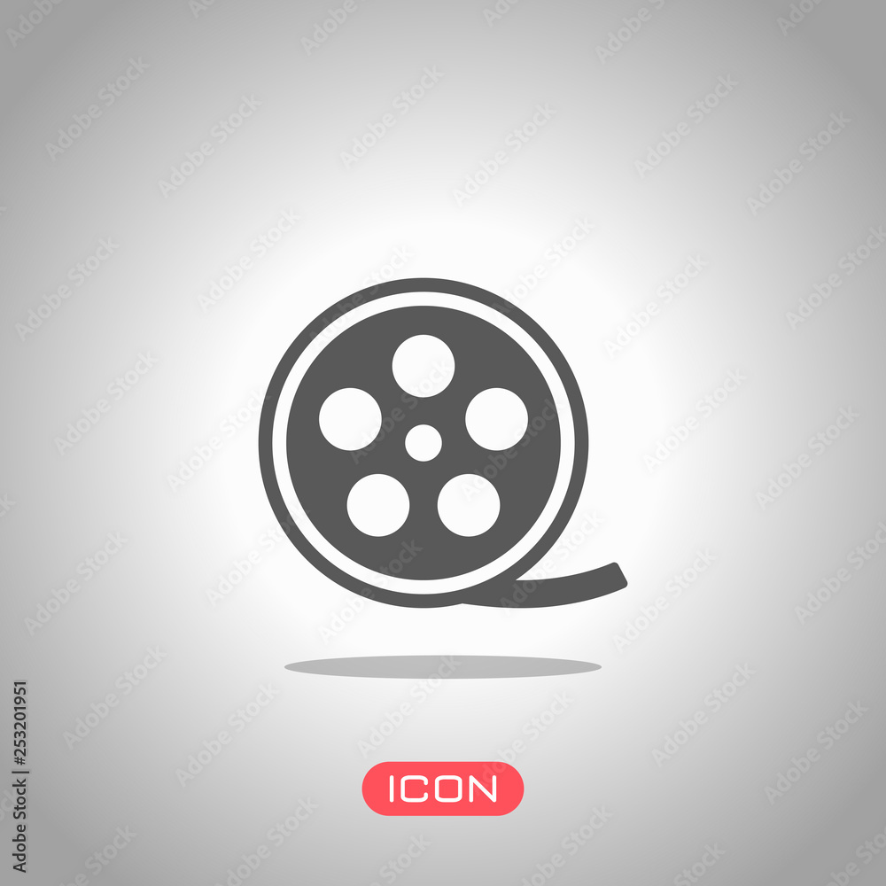 Film roll, old movie strip icon, cinema logo. Icon under spotlight. Gray background Film roll, old movie strip icon, cinema logo. Icon under spotlight. Gray background