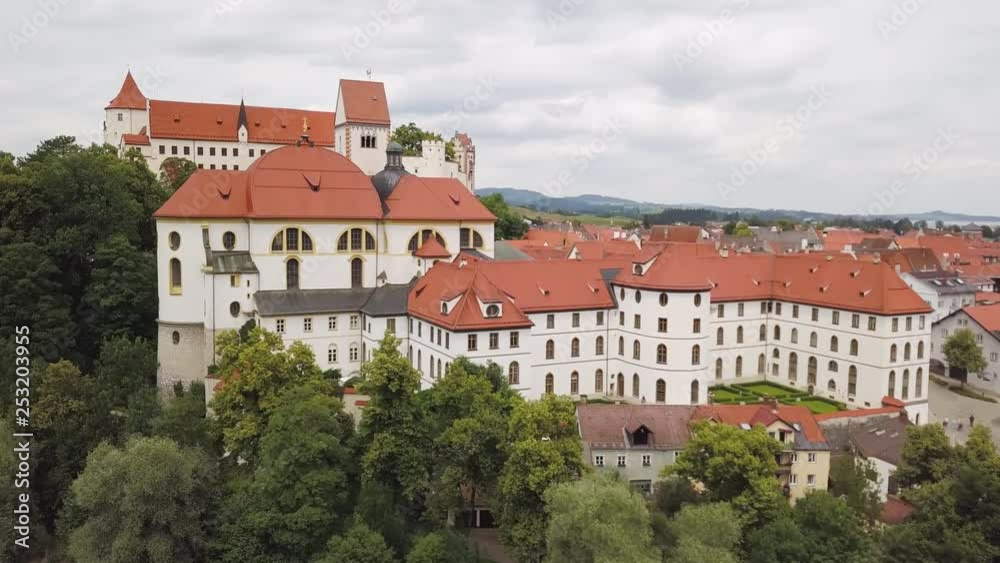 Amazing view of the Medieval castle and the surroundings of Fussen against the backdrop of an Alpine landscape with a bird's-eye view. Amazing view of the Medieval castle and the surroundings of Fussen against the backdrop of an Alpine landscape with a bird's-eye view.