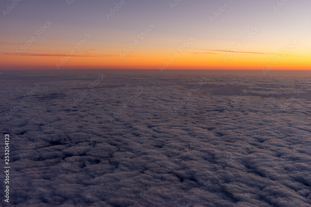 Netherlands, a sunset over a body of clouds Netherlands, a sunset over a body of clouds