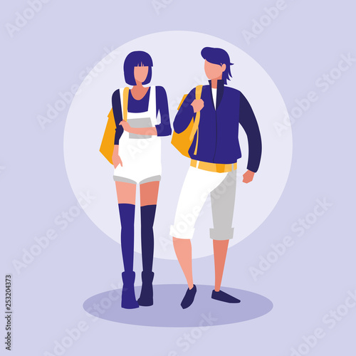young couple modeling with handbags