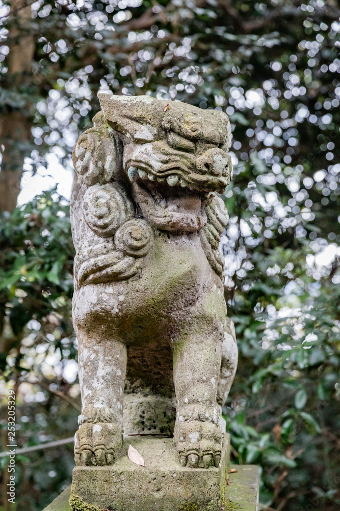 stone statue of a lion in Japan