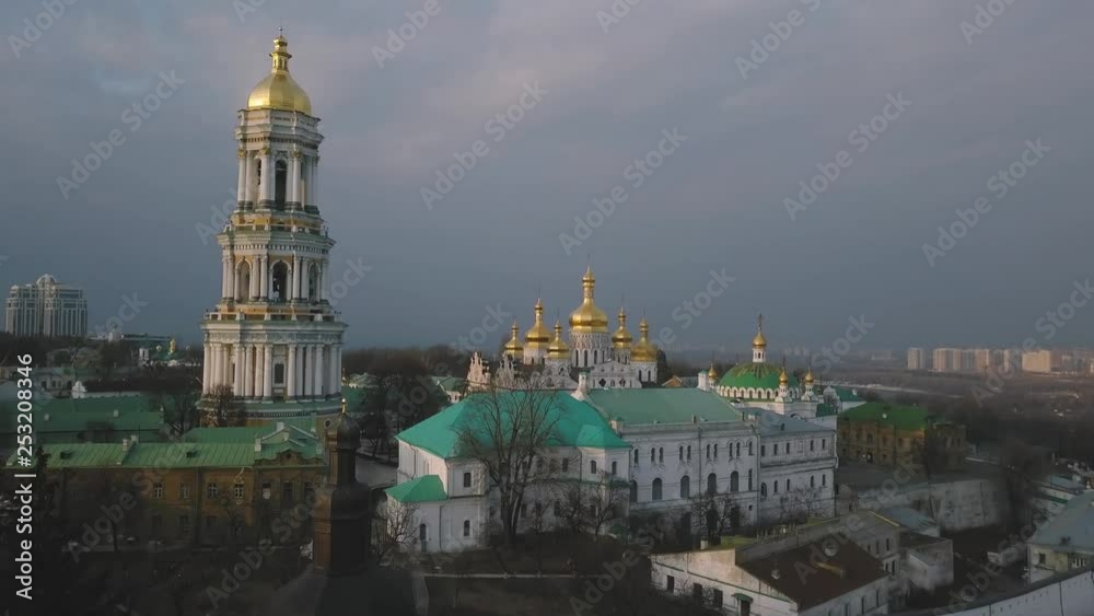 Aerial view on Sofiya Kyivska, one of the most famous ukrainian orthodox landmarks. Church with golden domes. Sunset and wide view on Kyiv city Aerial view on Sofiya Kyivska, one of the most famous ukrainian orthodox landmarks. Church with golden domes. Sunset and wide view on Kyiv city