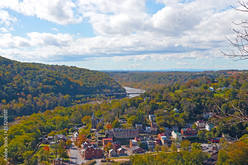 A view on Harpers Ferry historic town from a high point. West Virginia landscape in autumn with Harpers Ferry National Historic Park at the point where Potomac and Shenandoah rivers meet. photo