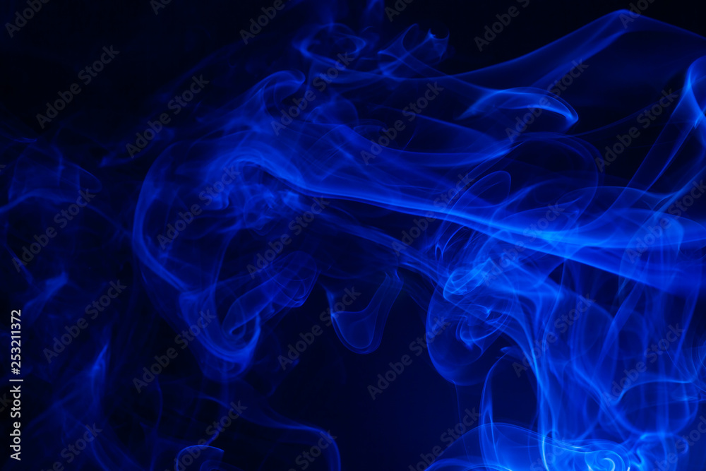 Blue smoke on black background. Blue smoke on black background.
