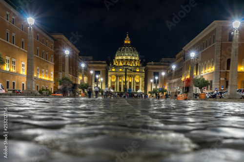 Vatican City,Italy - 23 June 2018: St.Peters Basilica is illuminated with lights at night in Vatican city in the square with moonlight at night