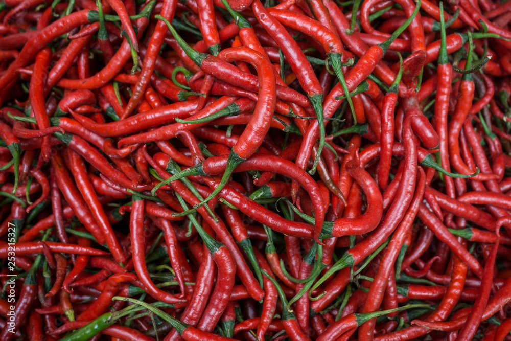 Fresh red chili peppers on sale in traditional market