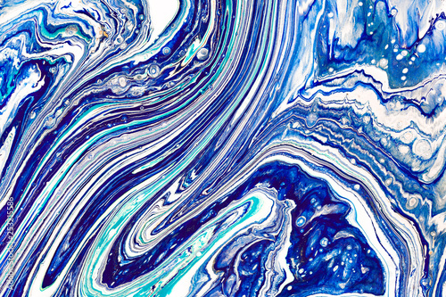 Hand painted background with mixed liquid blue, white, yellow paints. Abstract fluid acrylic painting. Applicable for packaging, invitation, textile, wallpaper, design of different surfaces © Mirror Flow