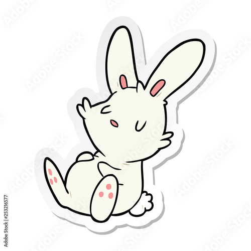 sticker of a cartoon rabbit sleeping