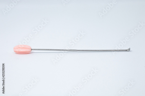 Close up ear pick isolated on white background