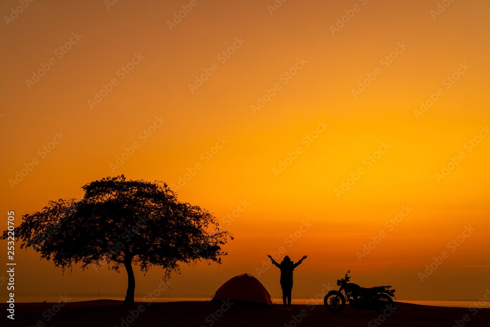 Silhouette of woman relax time with wonderful day for resting and vacation.