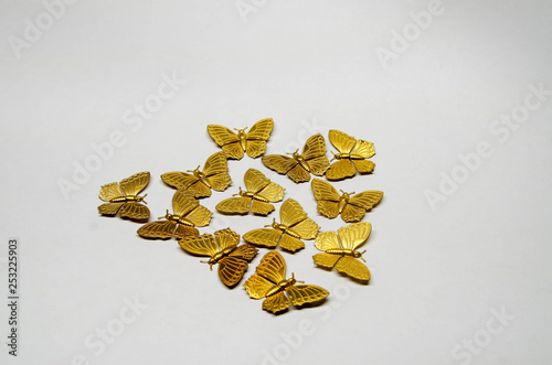 Buttterfly metal stampings in brass photo