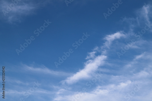 Scenery of bright cloudy blue sky in sunny day.