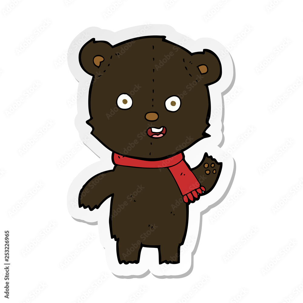 Obraz premium sticker of a cartoon waving black bear cub with scarf