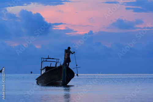 fishing boat at sunset