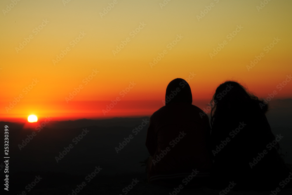 Couple silhouette at sunrise in Brazil