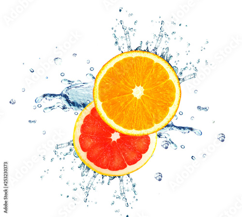 Fototapeta Naklejka Na Ścianę i Meble -  orange and grapefruit splashing water isolated on white