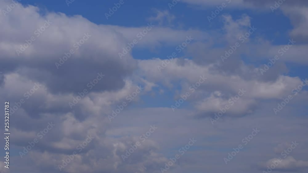 Time Lapse with White and Fluffy Clouds Moving Fast on Blue Sky Time Lapse with White and Fluffy Clouds Moving Fast on Blue Sky