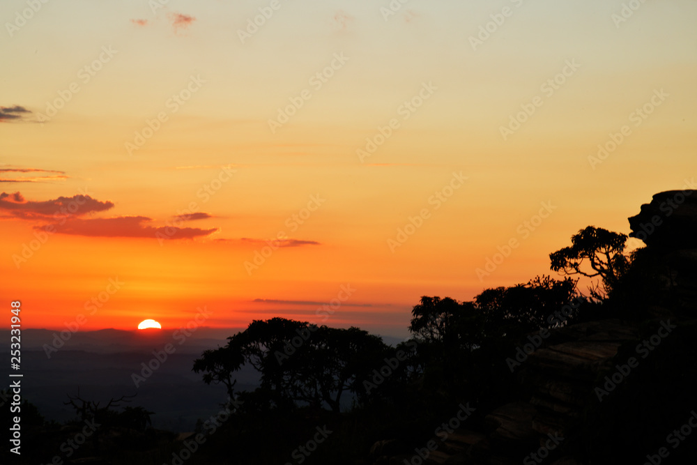 Stone profile and trees silhouettes at sunrise in Brazil Stone profile and trees silhouettes at sunrise in Brazil