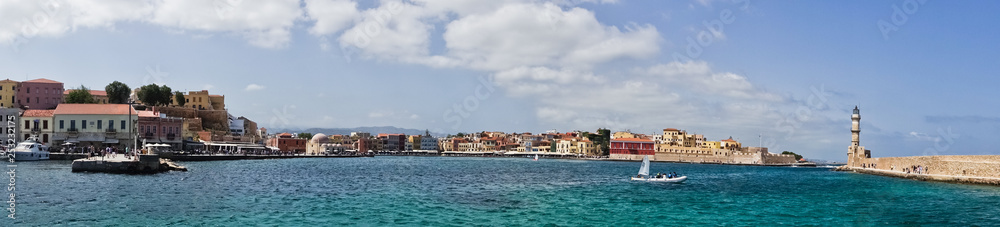 Panoramic view of the old venetian harbor with a lighthouse at Chania, island of Crete, Greece