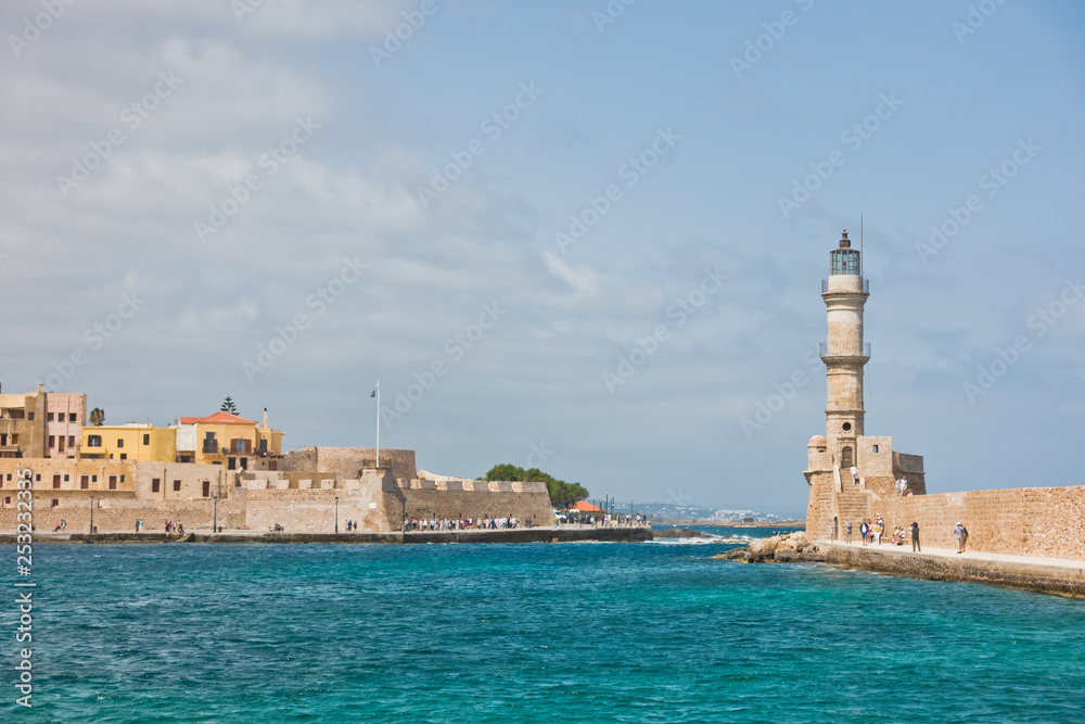 Panoramic view of the old venetian harbor with a lighthouse at Chania, island of Crete, Greece