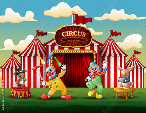 Happy clowns and rabbits performance on the arena