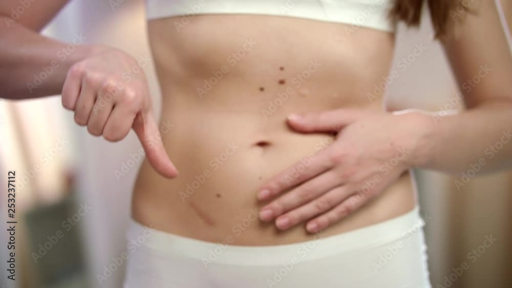 Woman unhealthy abdomen feeling. Unhappy girl belly. Unhealthy diet lifestyle Woman unhealthy abdomen feeling. Unhappy girl belly. Unhealthy diet lifestyle