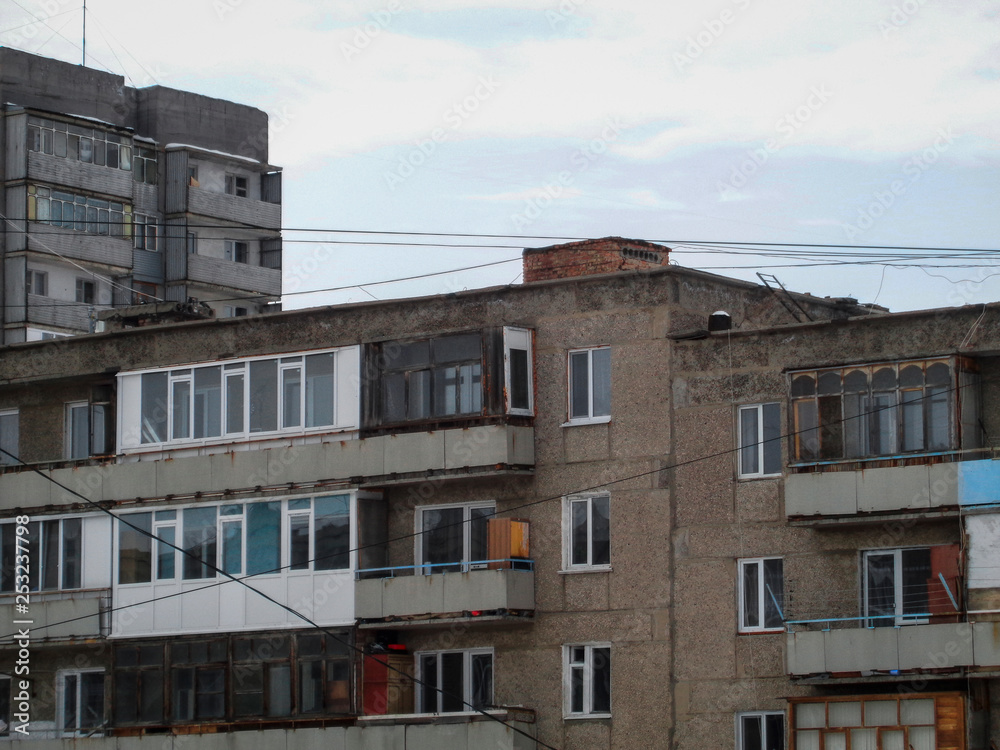 Fototapeta premium Apartment buildings on the outskirts of the city of Ust-Kamenogorsk (Kazakhstan). Old multistory apartment buildings. Architectural background