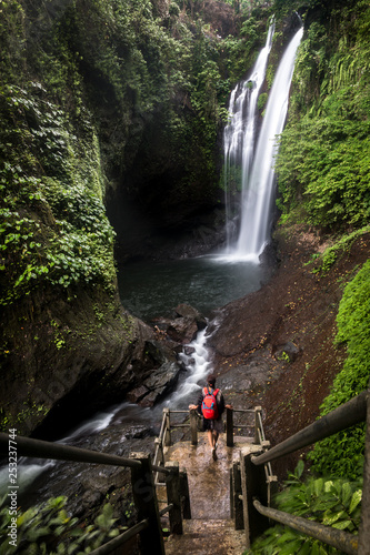 The huge waterfalls of Indonesian mountains and green canyons photo