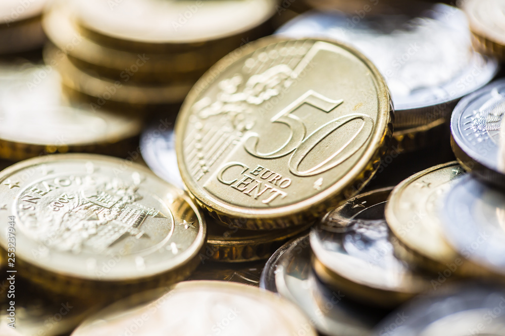 Close-up a pile of new euro coins in other compositions Close-up a pile of new euro coins in other compositions