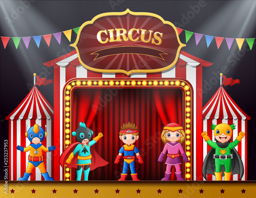Cartoon children in different costume on the stage