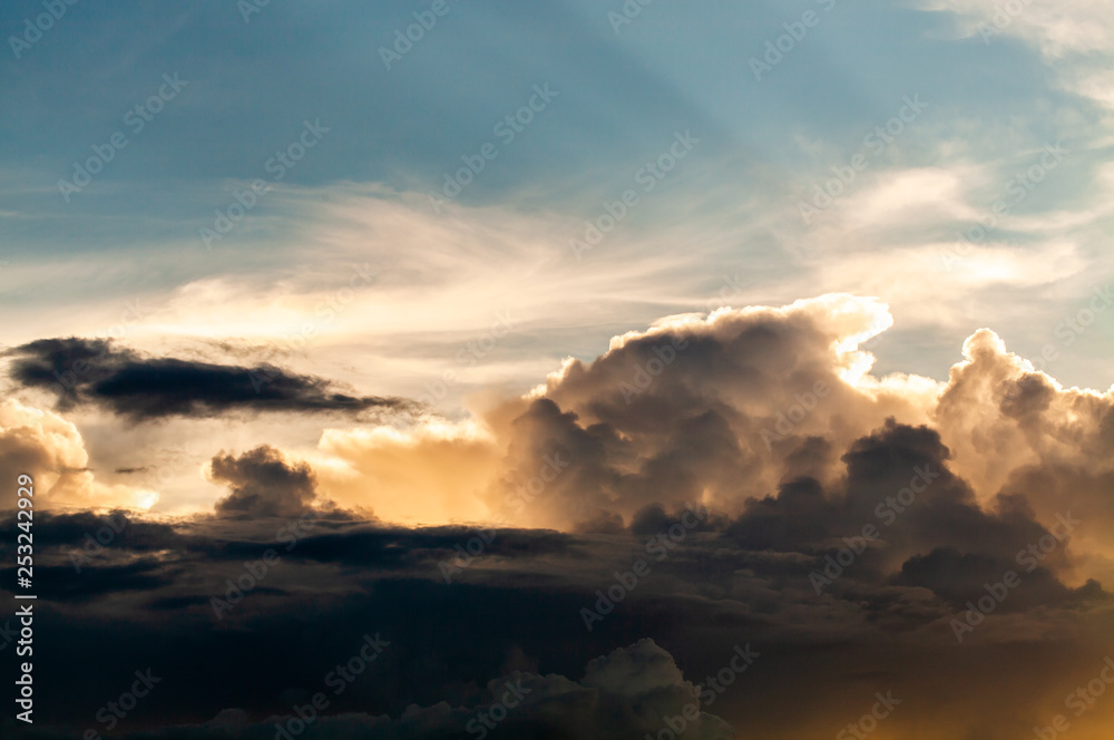 colorful dramatic sky with cloud at sunset.