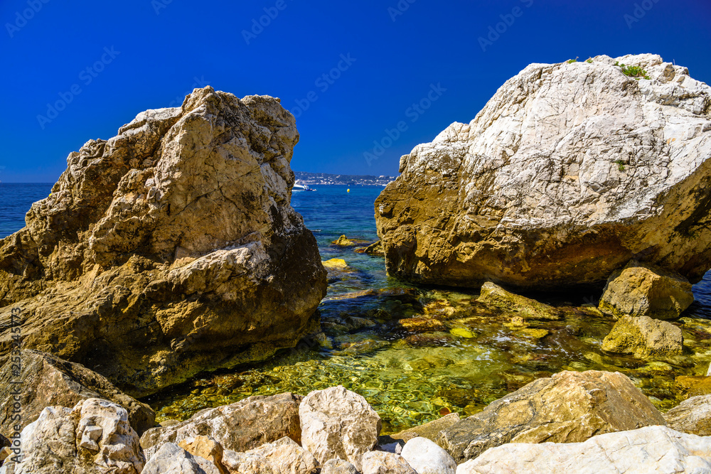 Sea beach with stones and rocks, Beausoleil, Nice, Nizza, Alpes-Maritimes, Provence-Alpes-Cote d'Azur, Cote d'Azur, French Riviera, France