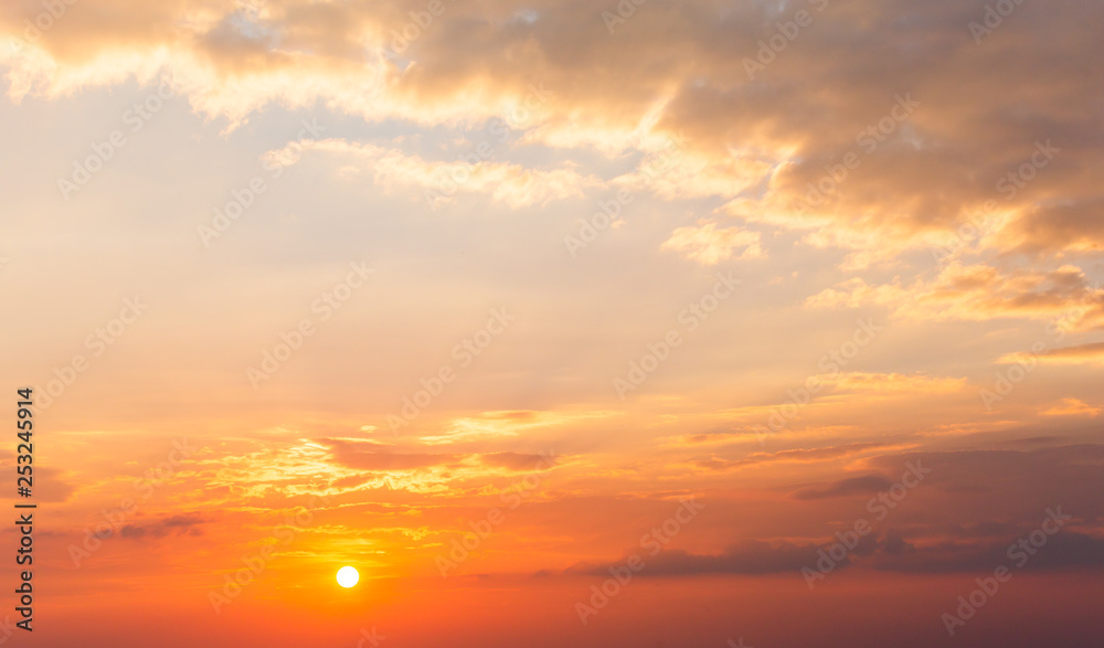 colorful dramatic sky with cloud at sunset.
