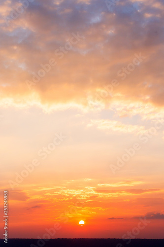 colorful dramatic sky with cloud at sunset.