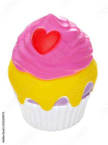 cake with pink cream and heart on white background side view