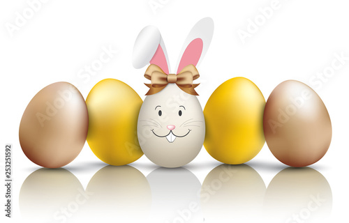4 Goldene Ostereier mit einem Ei als Osterhase