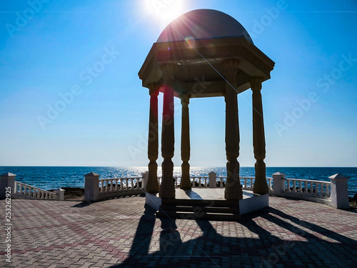 gazebo near the sea in the sunlight