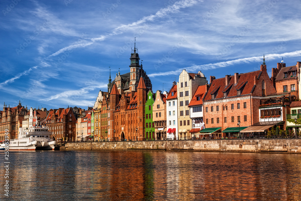 View of the riverside on Old Town by the Motlawa river in early morning light. Gdansk, Poland. 