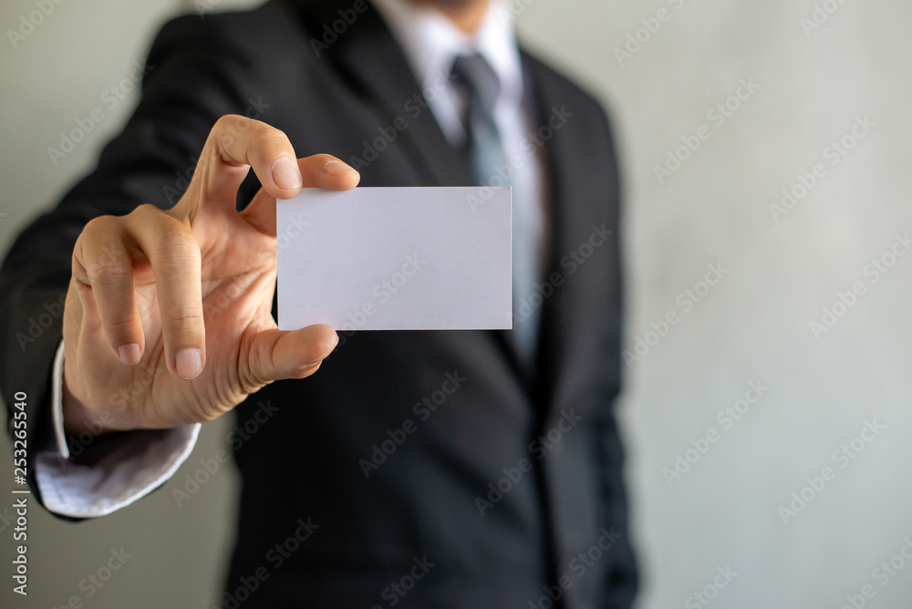 Man's hand showing business card,businessman holding blank visit card,Businessman showing blank business card isolated on white background. Man's hand showing business card,businessman holding blank visit card,Businessman showing blank business card isolated on white background.
