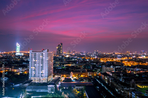 The background of the high angle view in the evening  overlooking the condominium that is under construction in a variety of heights  showing the habitat of the capital city.